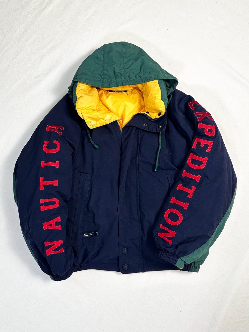 Vintage 90s Nautica Men Navy Puffer Jacket with Reversible Yellow Lining